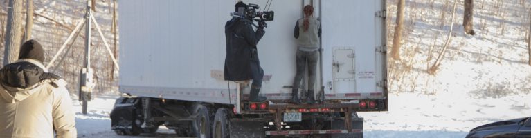 Sometimes you need to strap yourself to a truck to get the shot.
